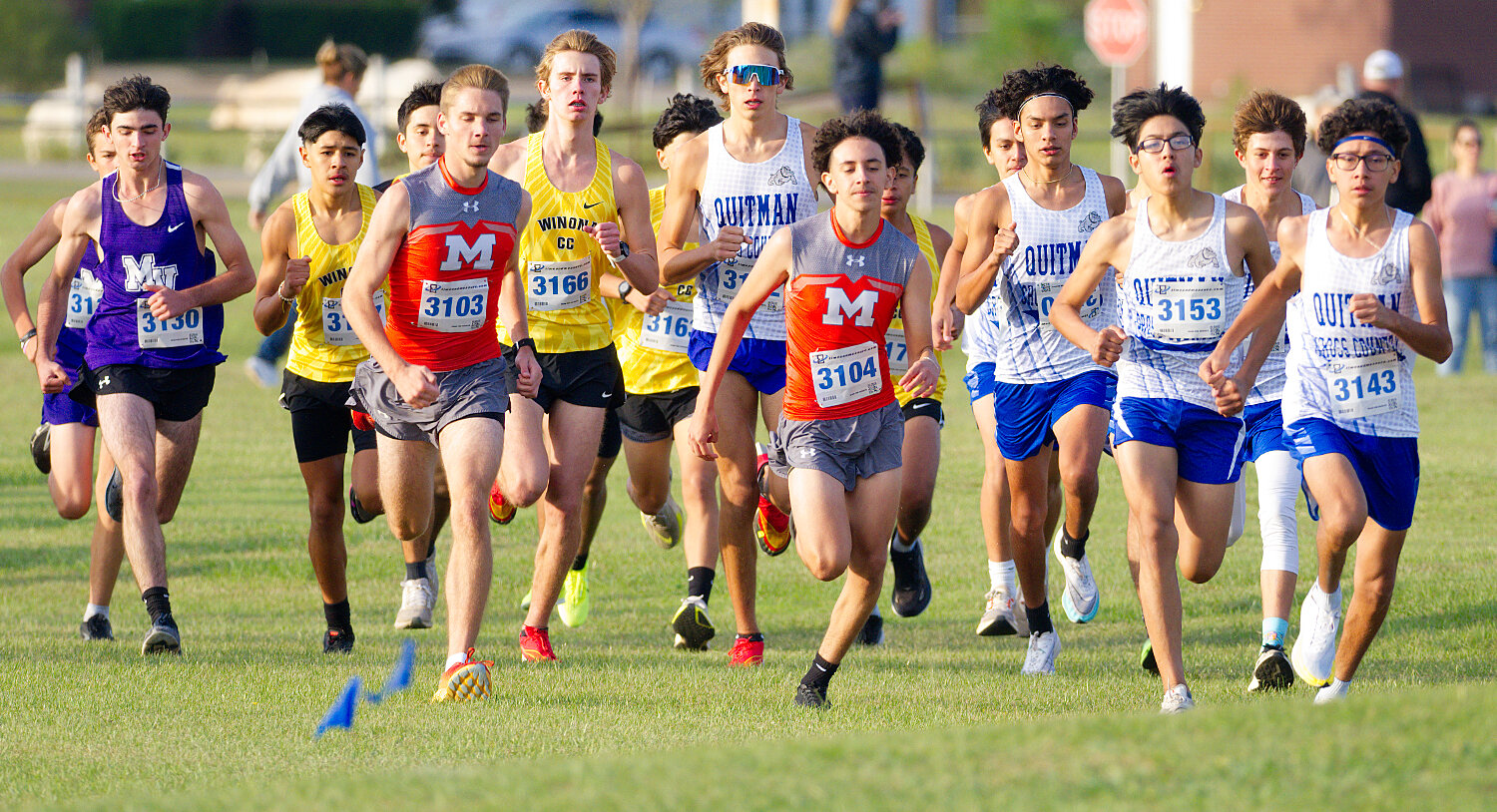 Runners for Mineola and Quitman in the boys district cross-country meet get off to a quick start. [see more XC]